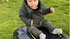 Watch This Kid Enjoy a Lawn Mower Ride
