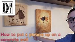 How To Hang a picture on a concrete wall