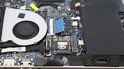 Installing the SSD Disk into the msata slot on the laptop. Installing a hard drive on a laptop. Laptop repair.