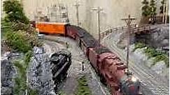 O scale run pulling the new real log load #train #railway #modelrailroad