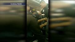 Disruptive airline passenger forcefully removed from plane