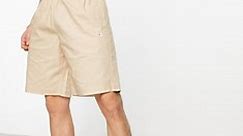Champion Legacy ripstop shorts in beige | ASOS