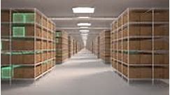 Flight through the warehouse. Shelves with cardboard boxes in a white...