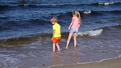 Kids Playing At The Beach Stock Footage Video (100% Royalty-free) 19758781