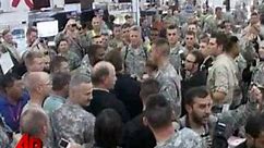 Schwarzenegger Drops in on US Troops in Iraq