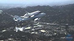F/A-18 extended view of Space Shuttle Endeavour's flyover Southern California