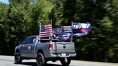 Convoys of Trump supporters take to roads after Biden campaign bus incident – video