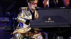 Elton John briefly hospitalized after fall, now back home in 'good health'