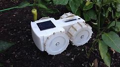 This adorable robot is a tiny solar-powered weed wacker