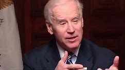 Buy a shotgun, says Joe Biden – video