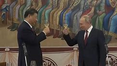 Vladimir Putin and Xi Jinping speak of friendship