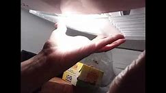 Replacing light bulb in my Kenmore refrigerator with top refrigerator.
