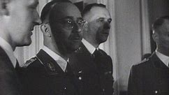1944: Heinrich Himmler awards Nazi medals and visits school