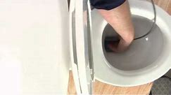 A Toilet That Won't Flush & a Sewer Smell Inside the Home : Toilet Repair