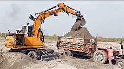 Heavy machinery Samsung excavator loading sand on tractor trolly | Heavy Machinery H.M