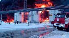 Russian oil depot catches fire after Ukrainian drone downed – video