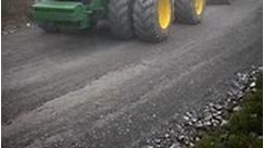 A powerful John Deere 4x4 tractor helps tow heavy duty