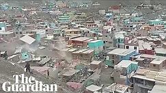 'A complete disaster': deadly landslide tears through village in Peru