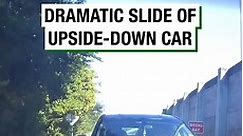 Dramatic Slide of Upside-Down Car