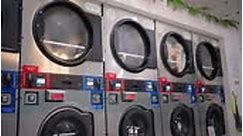 Self-service laundry equipment. Washing machines and dryers work in a...