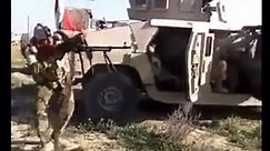 Iraqi soldier gets shot while spraying bullets with his PKM, Anbar,2015.