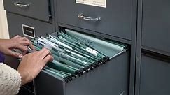Employees Search Documents Filing Cabinet Office Stock Footage Video (100% Royalty-free) 1017977086 | Shutterstock