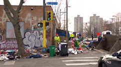Minneapolis city crews clear large encampment near Eat Street