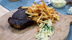 Bobby Flay serves up rib-eye steak frites with blue cheese butter