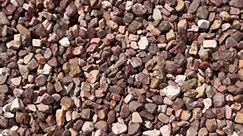 Cinnamon Gravel - one of many varieties of gravels and river rocks we stock at our stone yard located in Rockwall, TX. Come by to pick up or call our office to schedule a delivery ☎️ 214-771-0002 #classicrockstoneyard #fatetx #rockwalltx #rockshop #heathtx #LandscapeStone #naturalstone #gravel #riverrocks #pebbles | Classic Rock Stone Yard