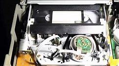 VCR tape loading/unloading/rewind