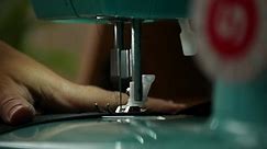 Female Hand Pushes Material Through Sewing Stock Footage Video (100% Royalty-free) 1033109090 | Shutterstock