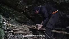 Completing the small wooden bed in the ancient cave