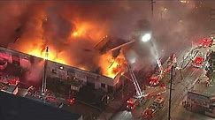 Massive fire erupts at commercial building in Huntington Park
