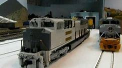 01.27.09 The HOT MTH HO Scale SD70ACe prototype engine next to my Overland one on the layout!