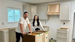 Kitchen cabinets are in 🙌🏼 We still have to add a cabinet to the left of the window after the countertops go in, stain the hood vent, and of course add the crown molding & hardware! But we are so excited with the progress! All of the cabinets are from @rtacabinetstore. They are the Weston Shaker style in Sand & Grizzly. We got ours preassembled to save some time, but you can choose to assemble them yourself to save money. The quality of these cabinets are a 10/10, everything is soft close! Use