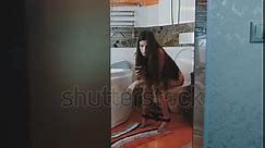 Young Girl Sitting On Toilet Stock Footage Video (100% Royalty-free) 19264750
