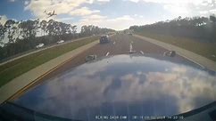 Truck dash cam video shows jet crashing on busy I-75 in Florida