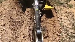 Machine digs trench, mulches garden and... - Machinery Direct