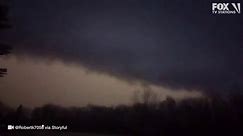 Tornado sirens wail in ominous Illinois storm footage