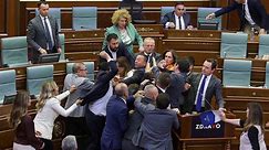Kosovo lawmakers brawl after opposition party member throws water on prime minister