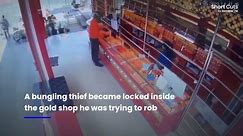 Bungling robber's heist foiled after he gets locked inside shop