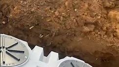 Plastic septic tank. Be sure fill it up before ya bury it #plumber #plumbing #tractor 2-07-2024