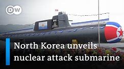 North Korea unveils its first tactical nuclear attack submarine | DW News