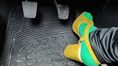 Pedal pumping in sandals heels in green socks
