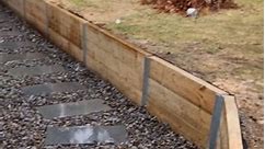 What a trasformation!! 🔥🔥 New retaining wall ✔ Bluestone stepping pavers ✔ Black slate rocks ✔ | Cedars Outdoors