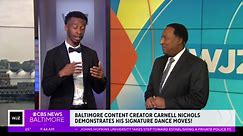 Baltimore content creator Carnell Nichols demonstrates his signature dance moves