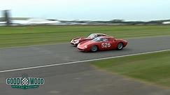 Ferrari 250 LM passes Ferrari 330 GTO into Woodcote