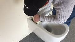 Removing VitrA V Care seat from the pan