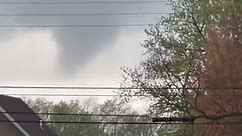 Tornado forms over homes in Woodburn, Kentucky