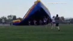 Watch another bounce house go airborne